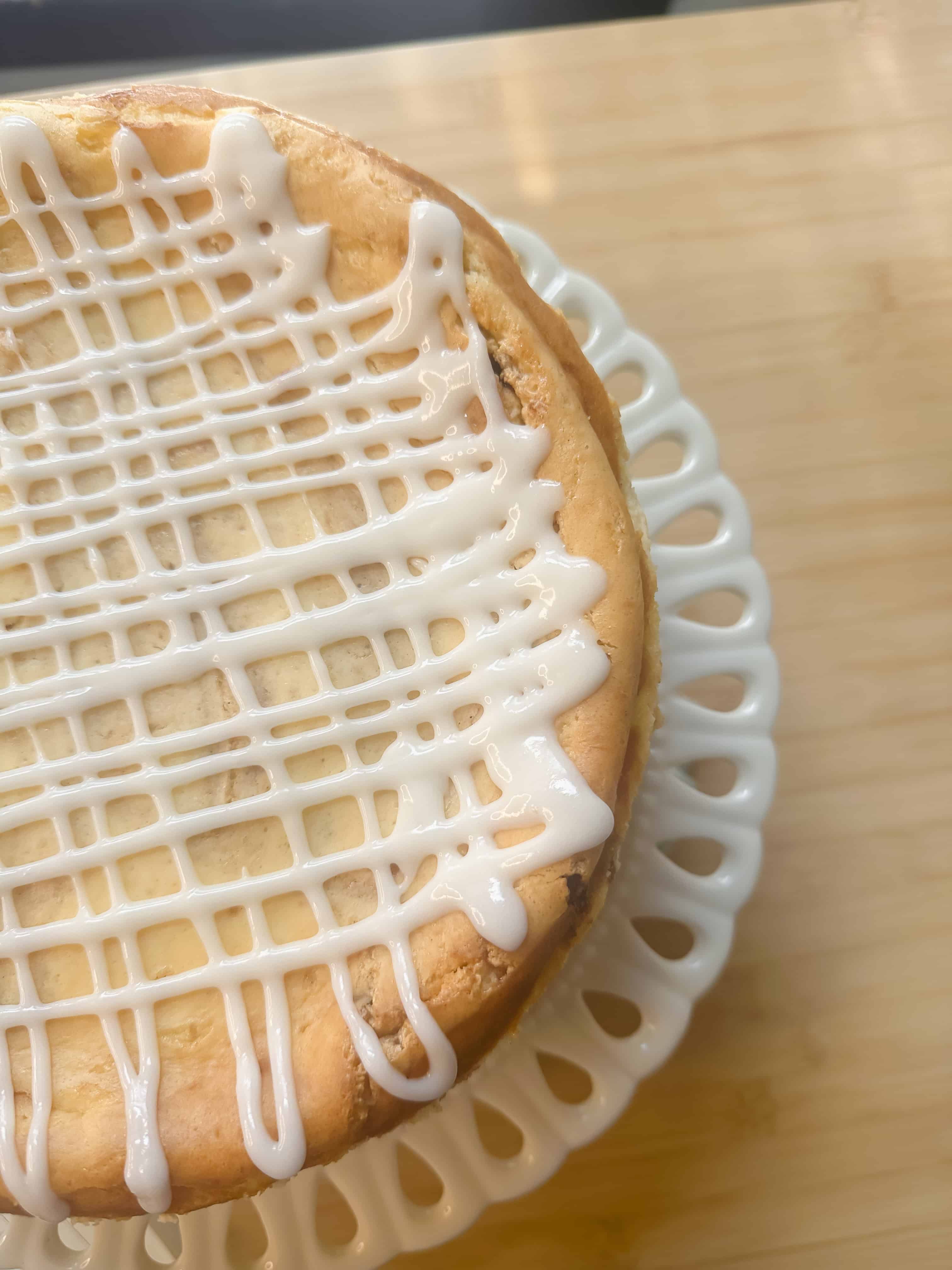 Top view of Cinnamon Roll Cheesecake with cinnamon sugar swirls.