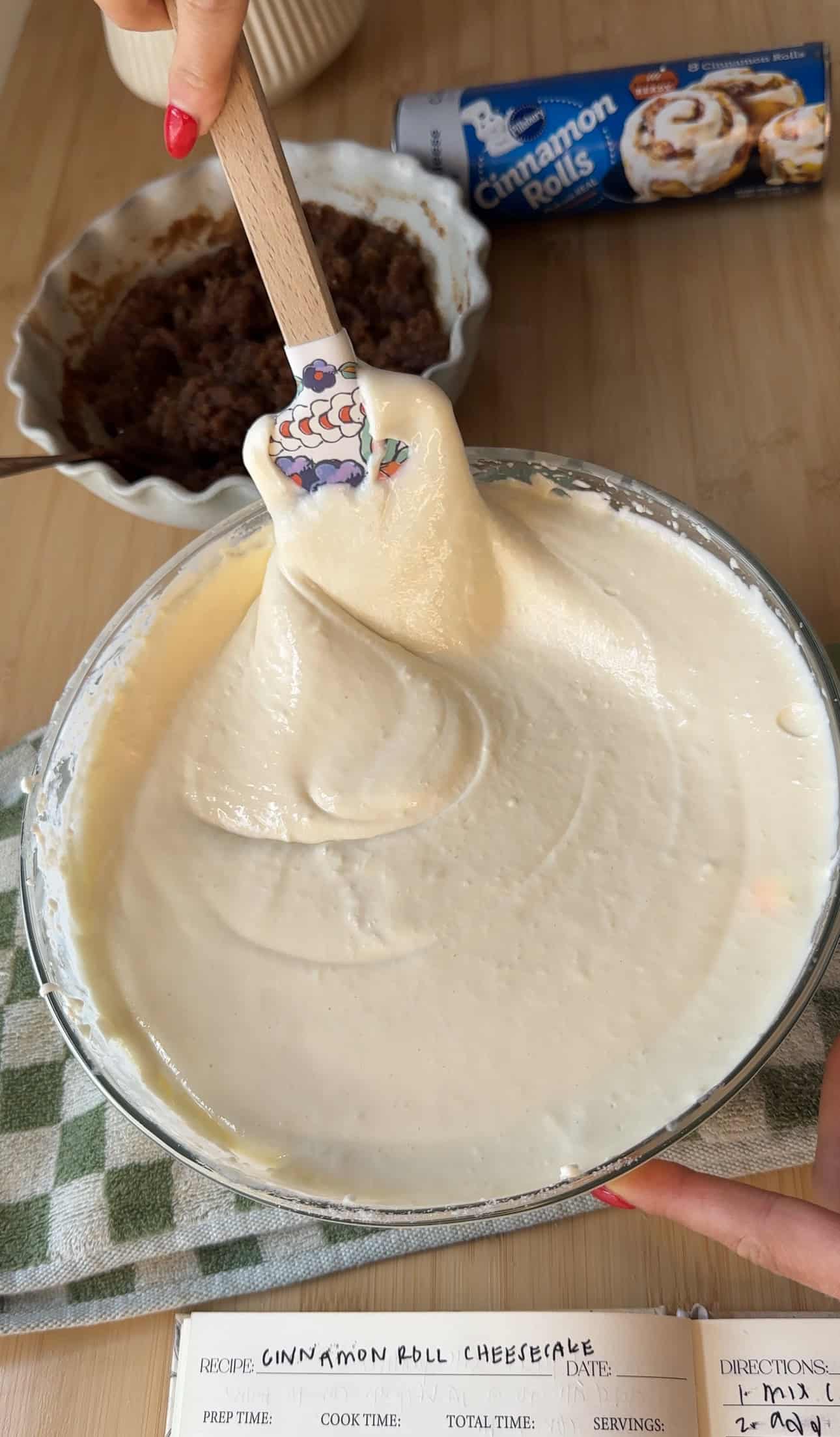 smooth and creamy cheesecake being mixed before baking