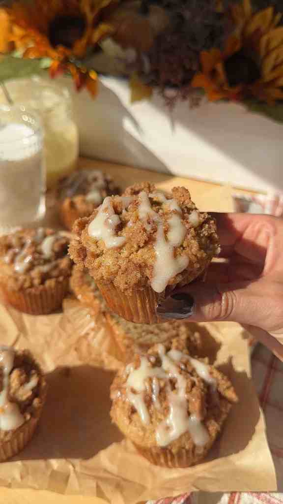 a close up a freshly glazed banana coffee cake muffin