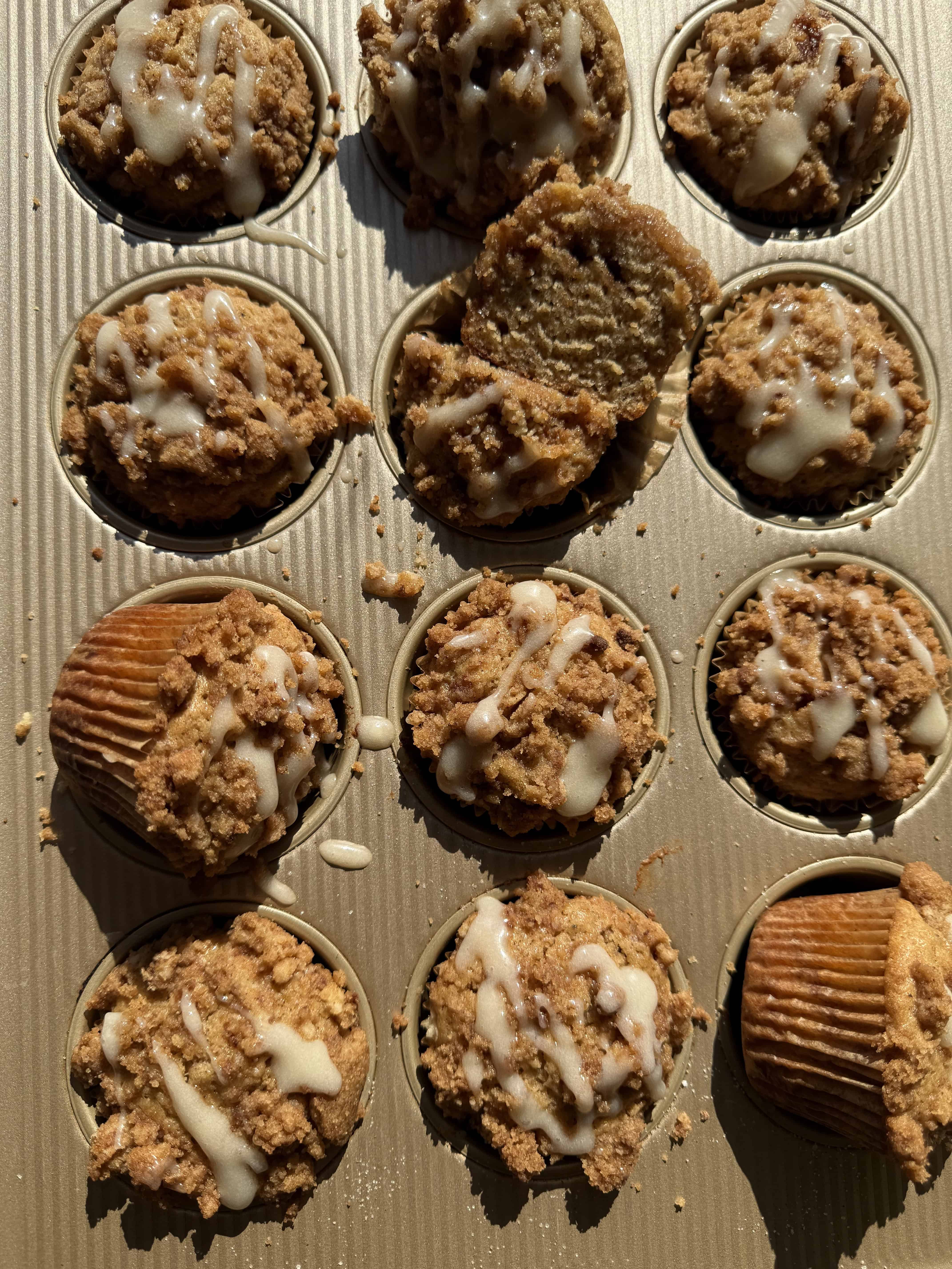 banana coffee cake muffin in a muffin pan right out of the oven