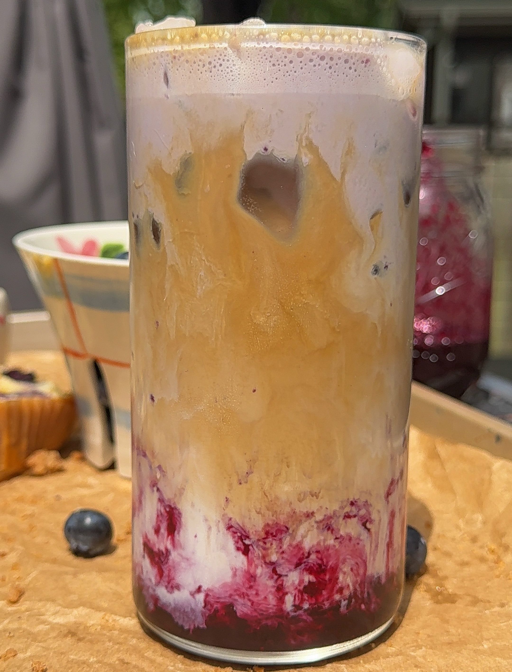 a close up of all of the layers of my blueberry latte