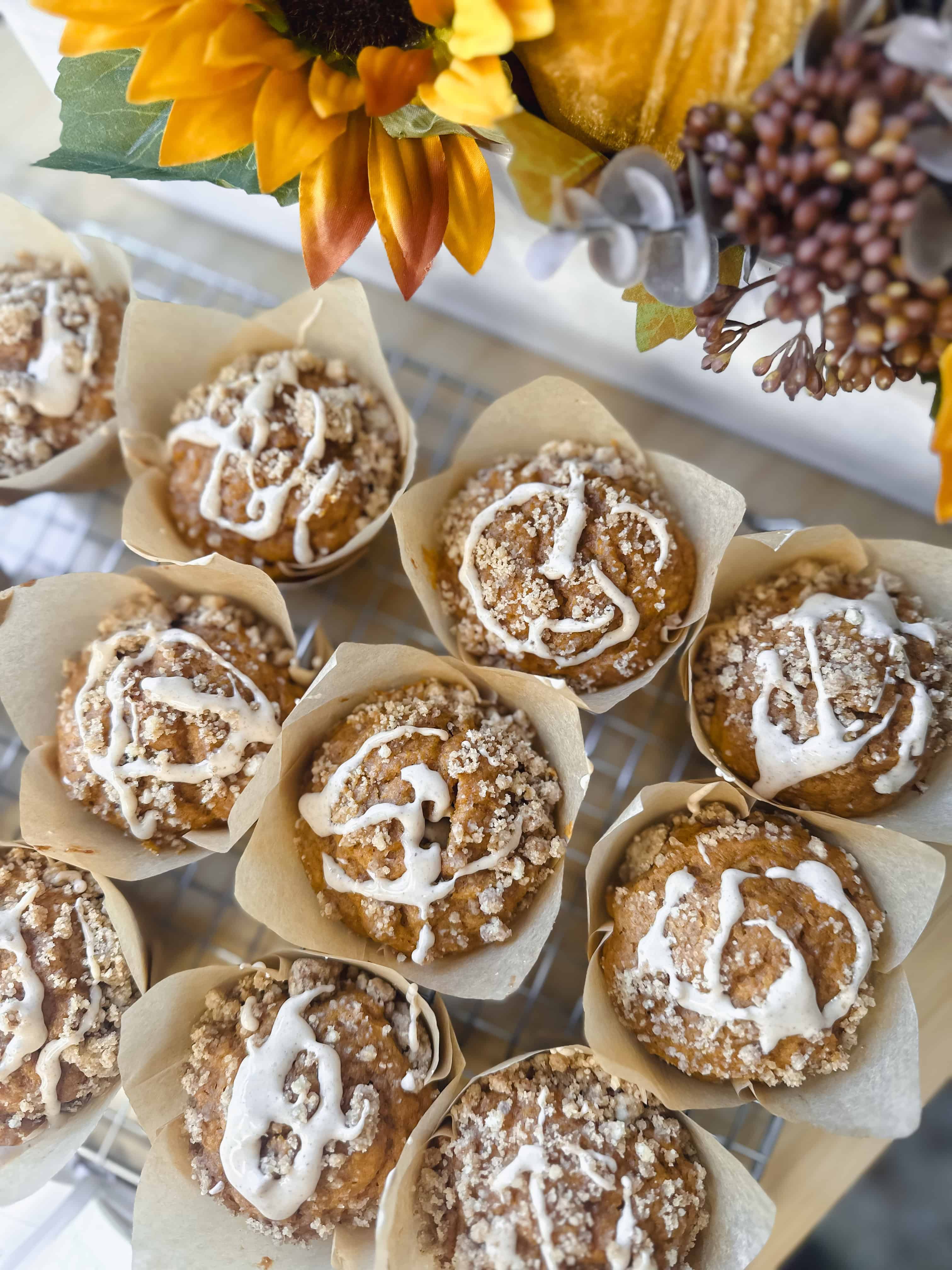 A close-up of the crumbly cinnamon topping on a warm pumpkin muffin.