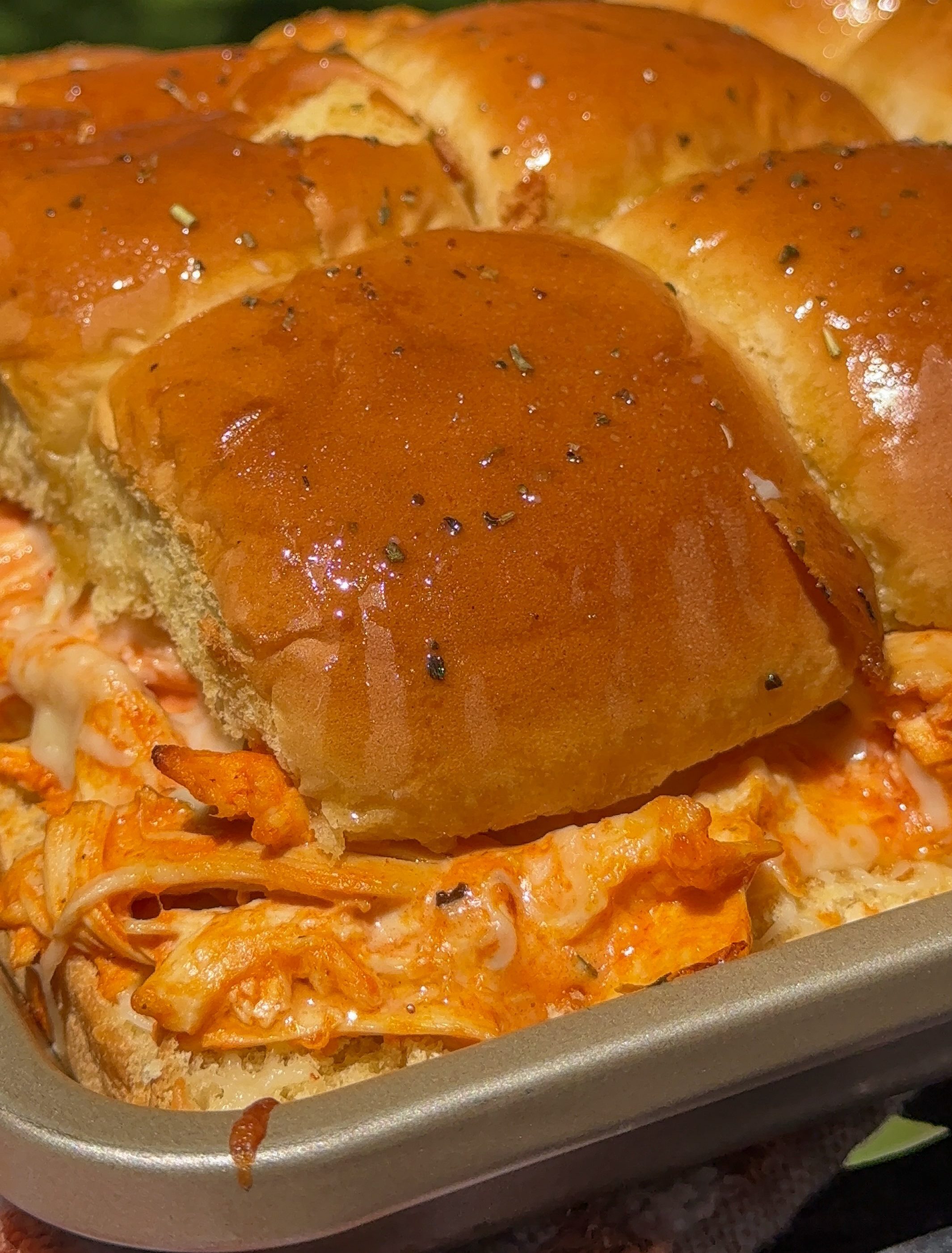 a sheetpan full of my buffalo chicken sliders outside for a potluck