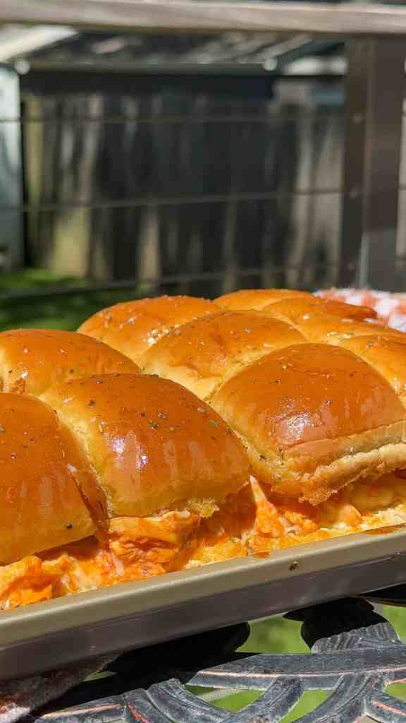 a sheetpan full of my buffalo chicken sliders outside for a potluck