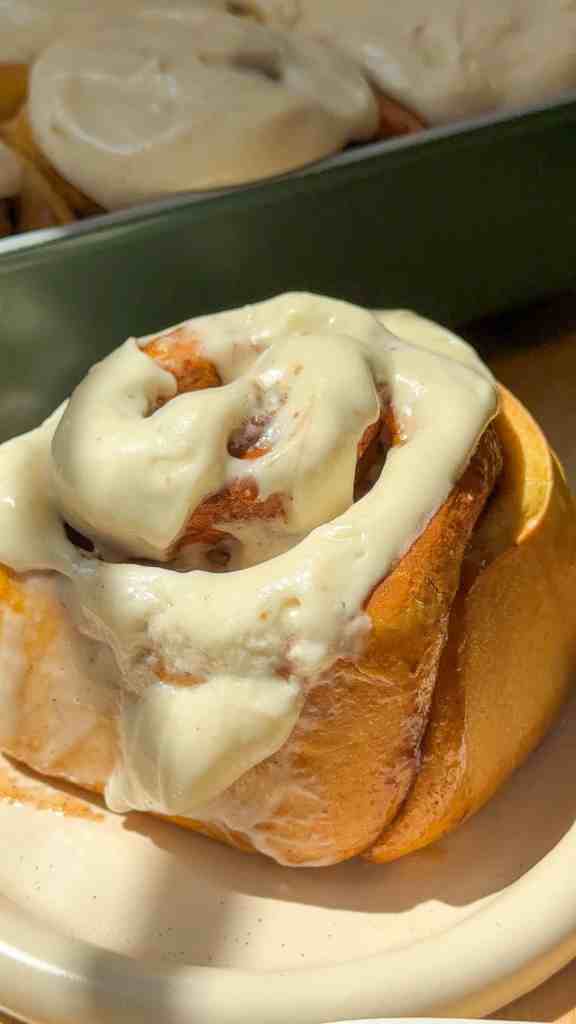Brown Butter Pumpkin Cinnamon Rolls with Maple Cream Cheese Frosting