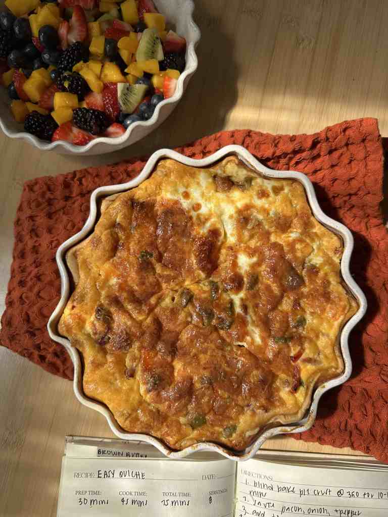 the final product of my easy bacon and cheese quiche served with a simple fresh fruit salad
