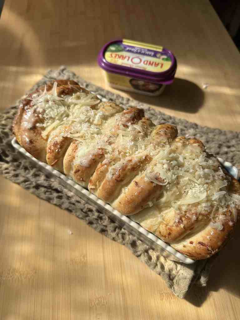 Whip up this cheesy garlic pull apart bread with just three simple ingredients! Buttery, garlicky, and loaded with Parmesan, it’s the perfect side dish or snack. Ready in 30 minutes, this recipe is quick, easy, and absolutely delicious!