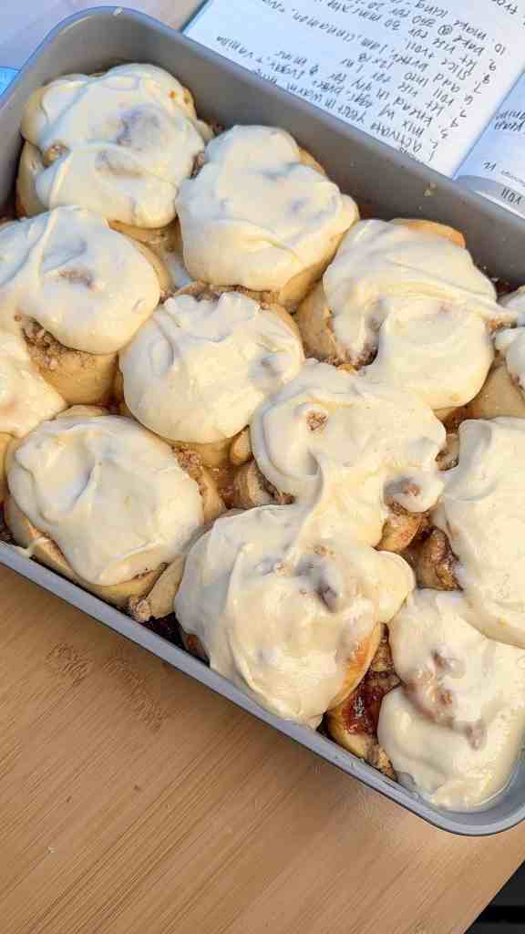 freshly iced peach cobbler cinnamon rolls